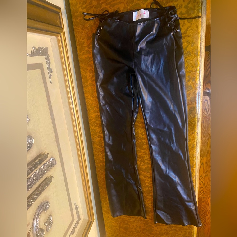 New Pink black pleather pants, brand new, size medium but fits like a small